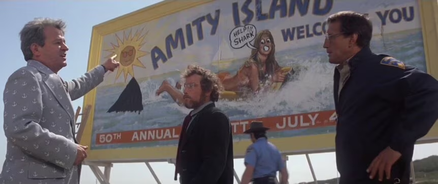 still from the movie JAWS showing a vandalized billboard for Amity Island