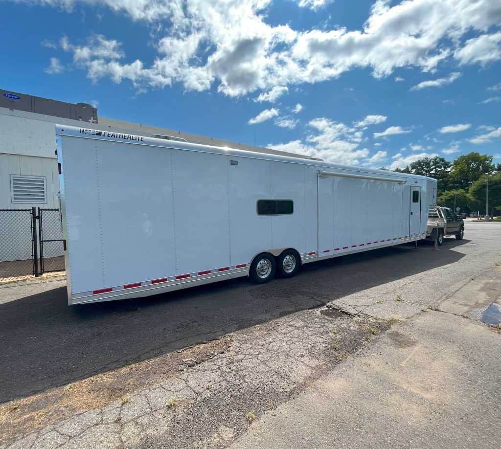 Photograph of the exterior of the trailer before the wrap was designed and applied